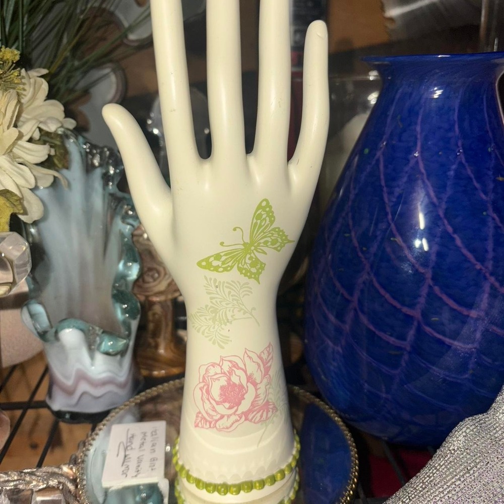 White ceramic jewelry holder hand with graphics